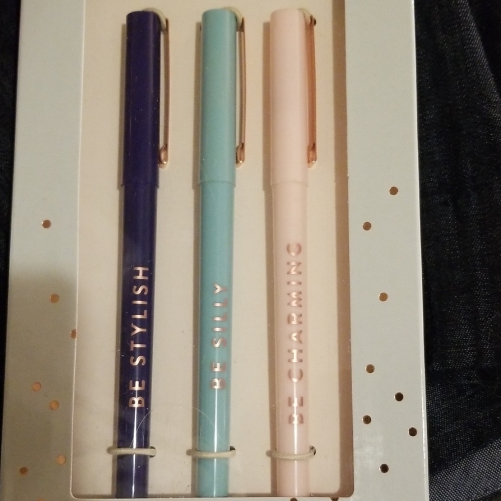 3 black ink pens.
